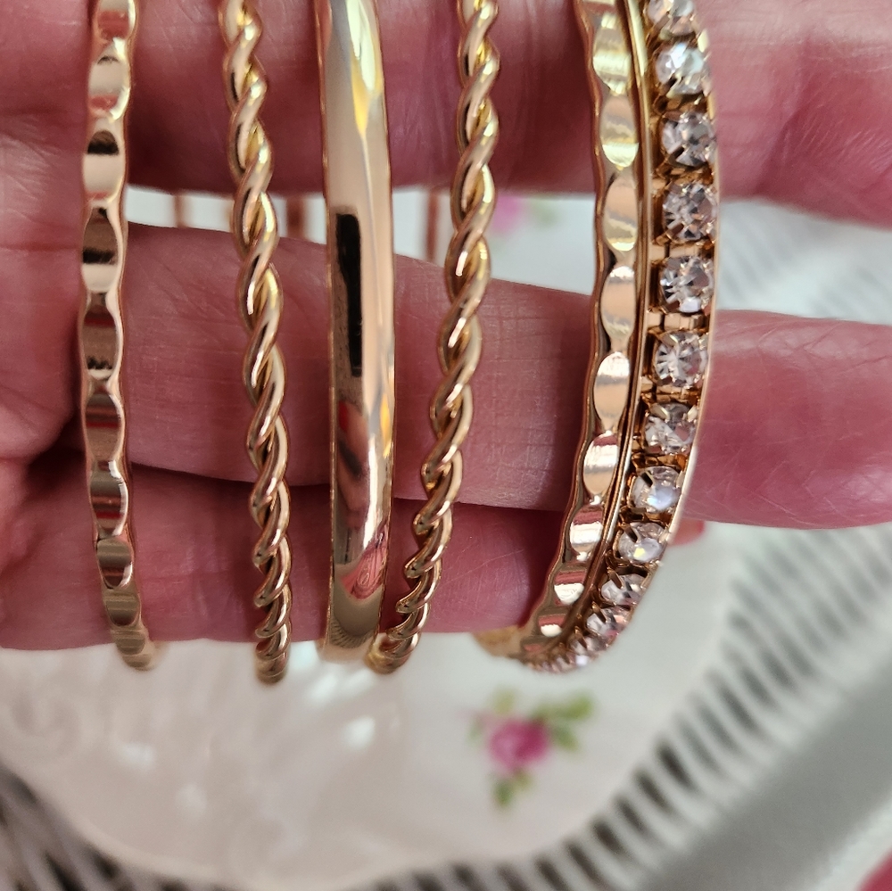 Gold tone set of bangle bracelets